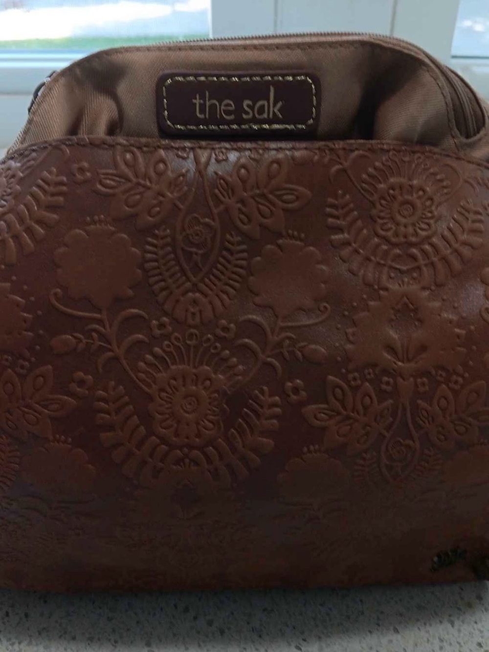 The Sak Embossed Floral Leather Crossbody in Cognac Brown - Picture 2 of 2